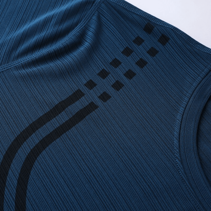 Close-up of a blue elastic quick-dry men's sportswear t-shirt with a modern pattern, ideal for training and active sports.