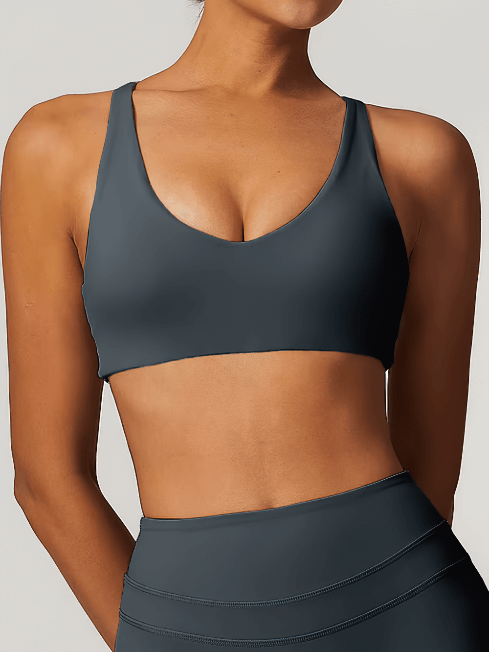 Stylish nylon spandex racerback sports bra SF2454 in dark gray for women's yoga and fitness. Breathable, quick-dry design.