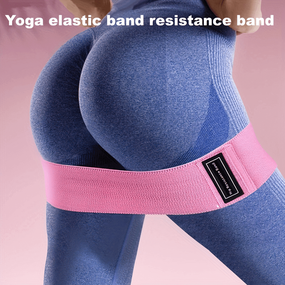 Elastic pink resistance band for booty and leg workout, perfect for yoga and Pilates, offering strong support for fitness exercises.