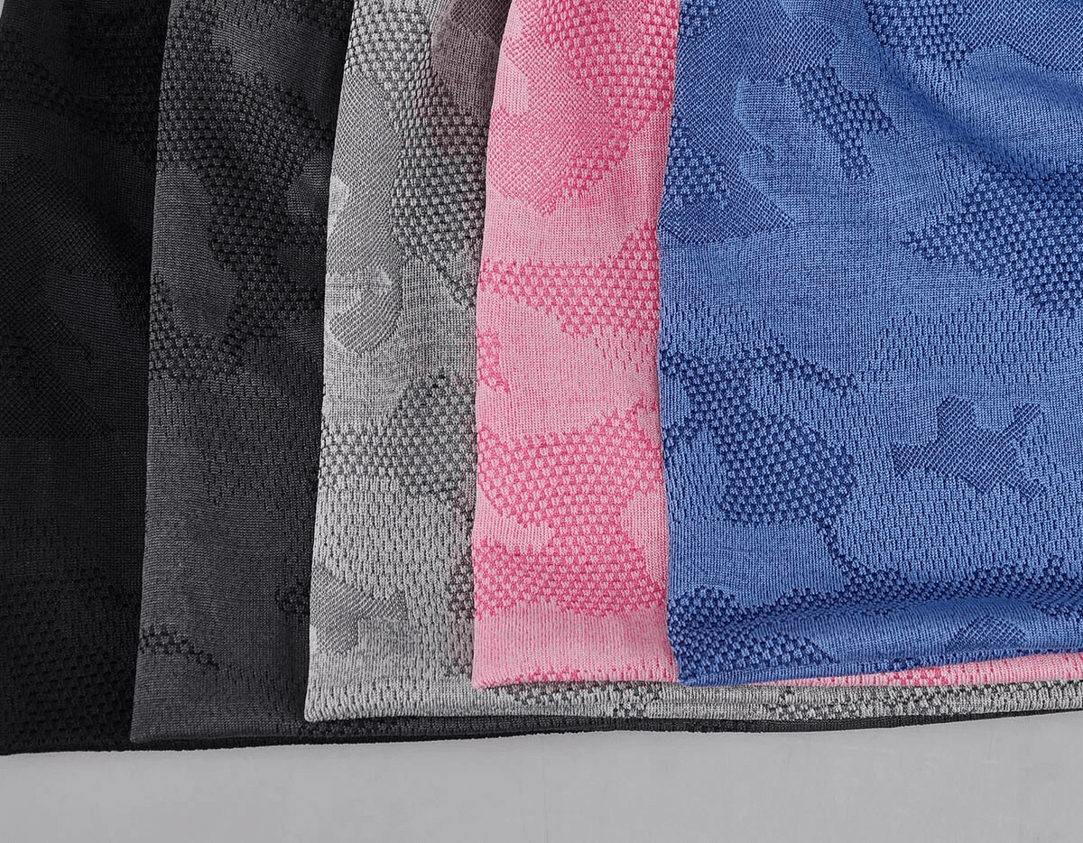 Four elastic soft baggy beanies in black, gray, pink, and blue with a geometric pattern, ideal for sun protection and unisex style.