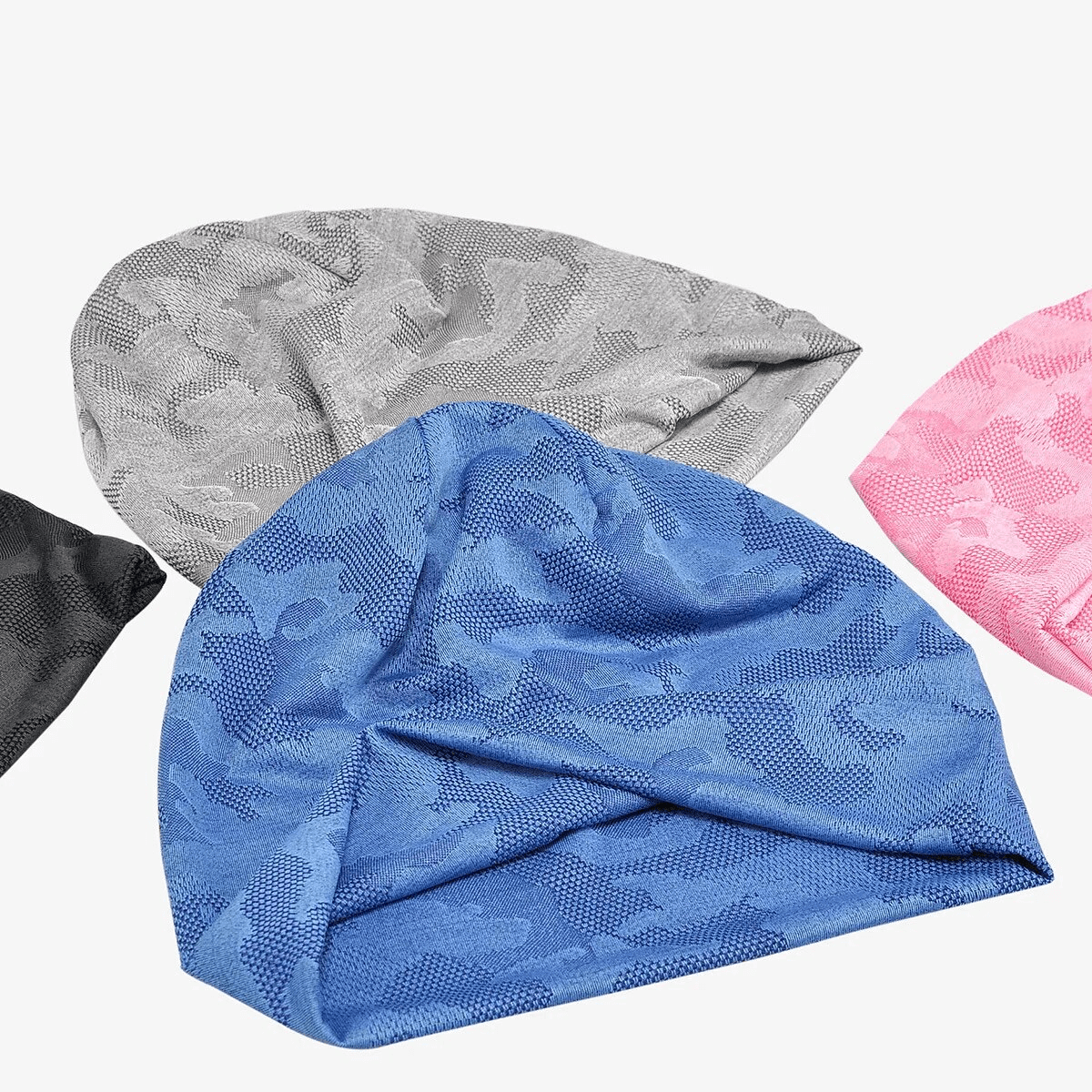 Elastic soft baggy beanie in geometric patterns, available in blue, grey, black, and pink, ideal for sun protection and style.