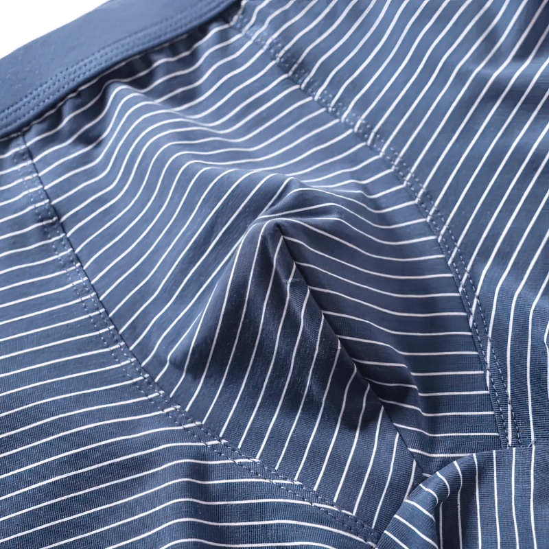 Close-up of breathable, moisture-wicking Elastic Soft Men's Boxers in solid pattern for comfort.