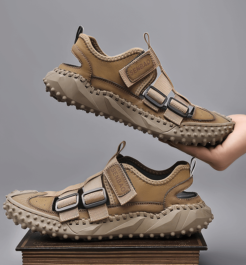 Elastic Soles Leather Men's Hiking Sandals with Breathable Nylon Upper displayed on a wooden surface.