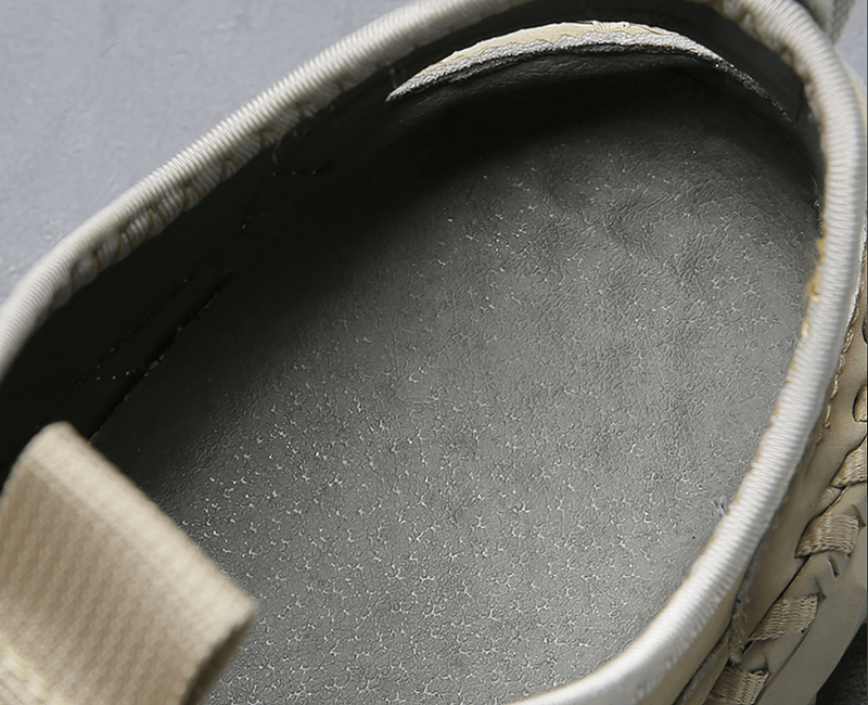 Close-up view of the inner sole of Elastic Soles Leather Men's Hiking Sandals, showcasing breathable upper and comfort lining.