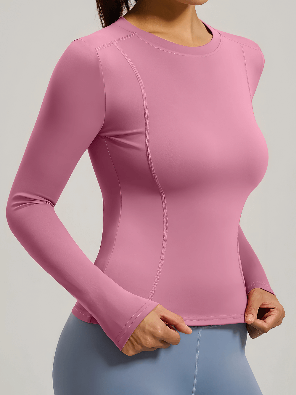Woman wearing Elastic Sport Long Sleeve Top for Women - SF4131 in pink, ideal for yoga and fitness, showing breathable and durable fabric.
