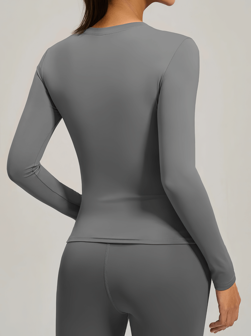 Back view of Elastic Sport Long Sleeve Top for Women - SF4131, showcasing breathable, quick-dry design ideal for yoga and fitness activities.