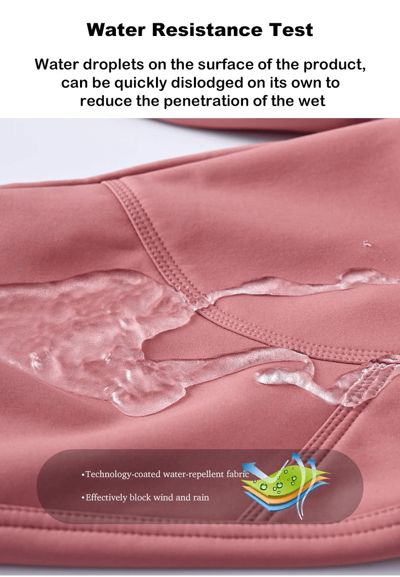 Water droplets beading on waterproof, windproof outdoor pants fabric during a water resistance test.