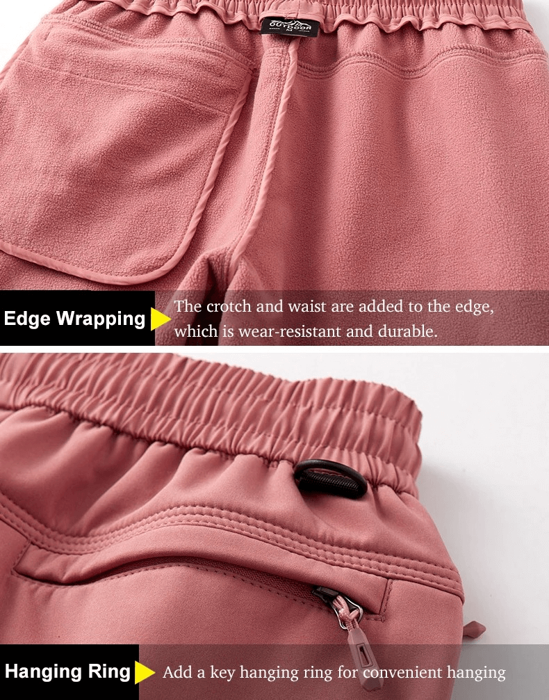 Close-up of pink elastic waist outdoor pants with edge wrapping and hanging ring for trekking and skiing. Model SF2007.