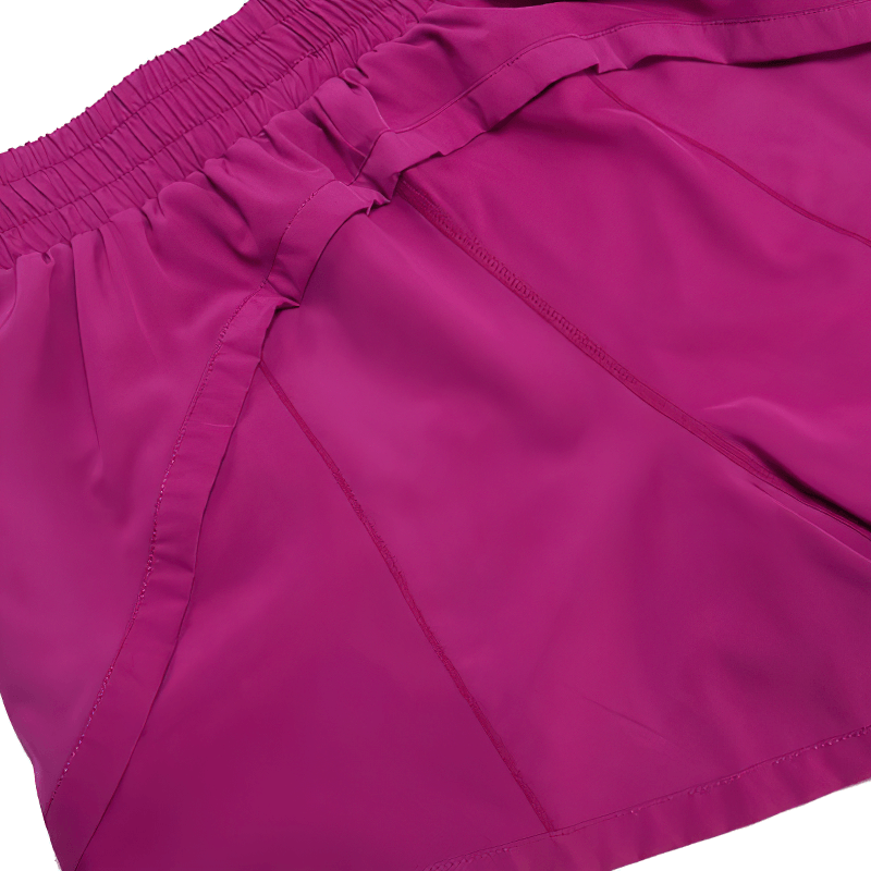 Vibrant pink elastic waist 2-in-1 active shorts with pocket, perfect for an active lifestyle and flexible comfort. SF2228 style.