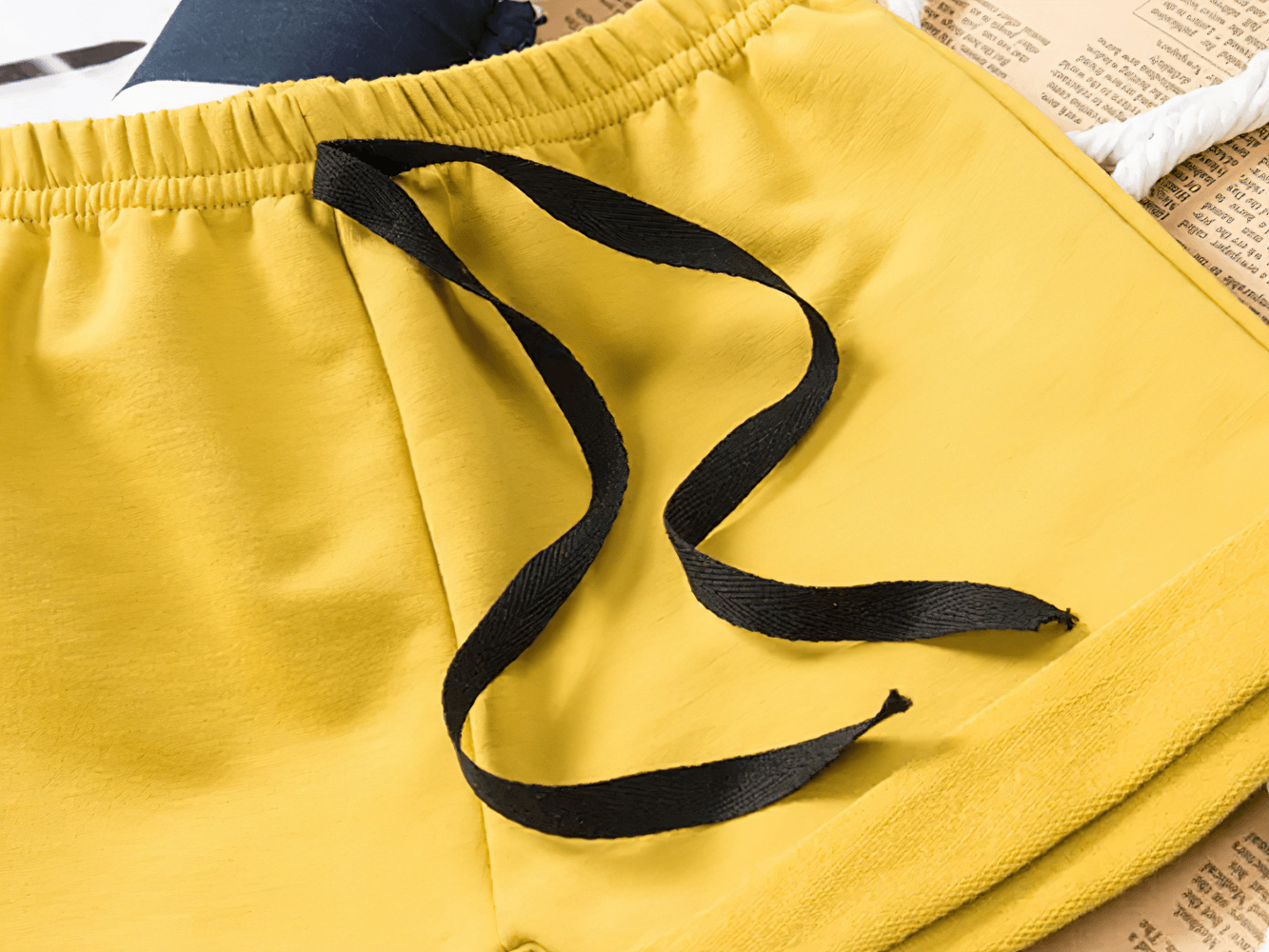 Elastic-Waist Solid Shorts With Drawstring Detail - SF3725, soft cotton design, showing elastic waist and adjustable drawstring close-up.