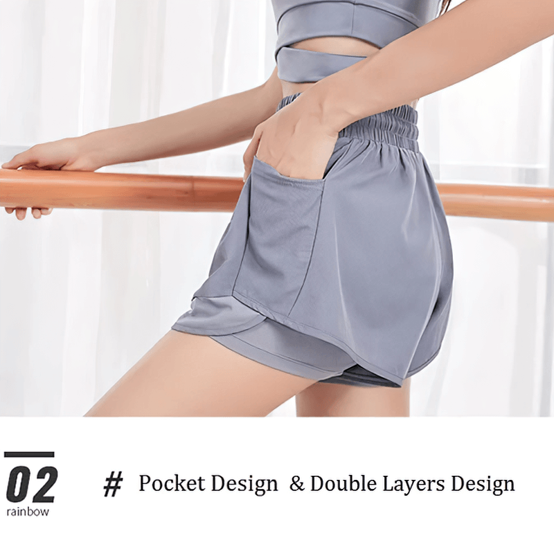 Woman wearing elastic waistband sports shorts with side pocket, showcasing pocket and double-layer design, perfect for workouts.