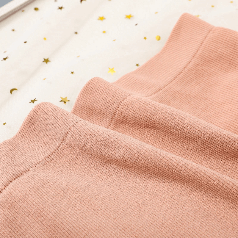 Close-up of elastic high waist cotton briefs in pink with a smooth finish and seamless design, perfect for everyday wear.