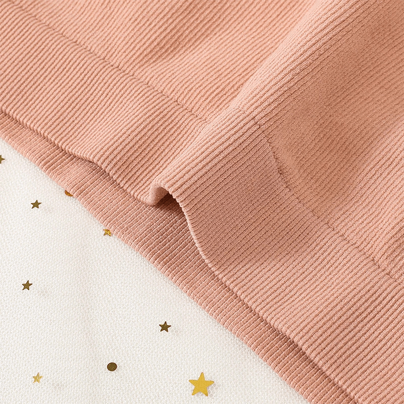 Close-up of high-waist elastic cotton briefs in solid color showcasing ribbed texture and seamless finish.