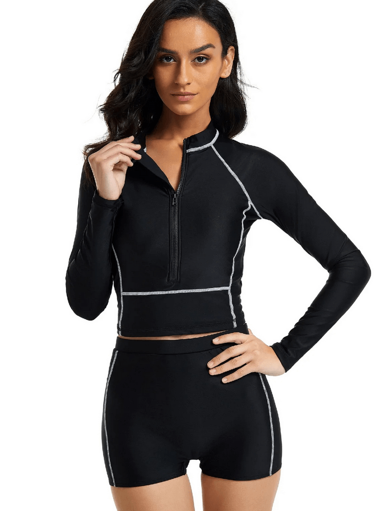 Elastic women's long-sleeves separate surfing swimsuit in solid black, designed for female athletes with nylon and spandex for comfort.