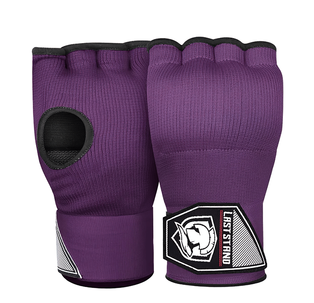 Purple elasticated inner hand wraps with gel padding, ideal for MMA and boxing. Features breathable fabric and secure hook and loop closure.