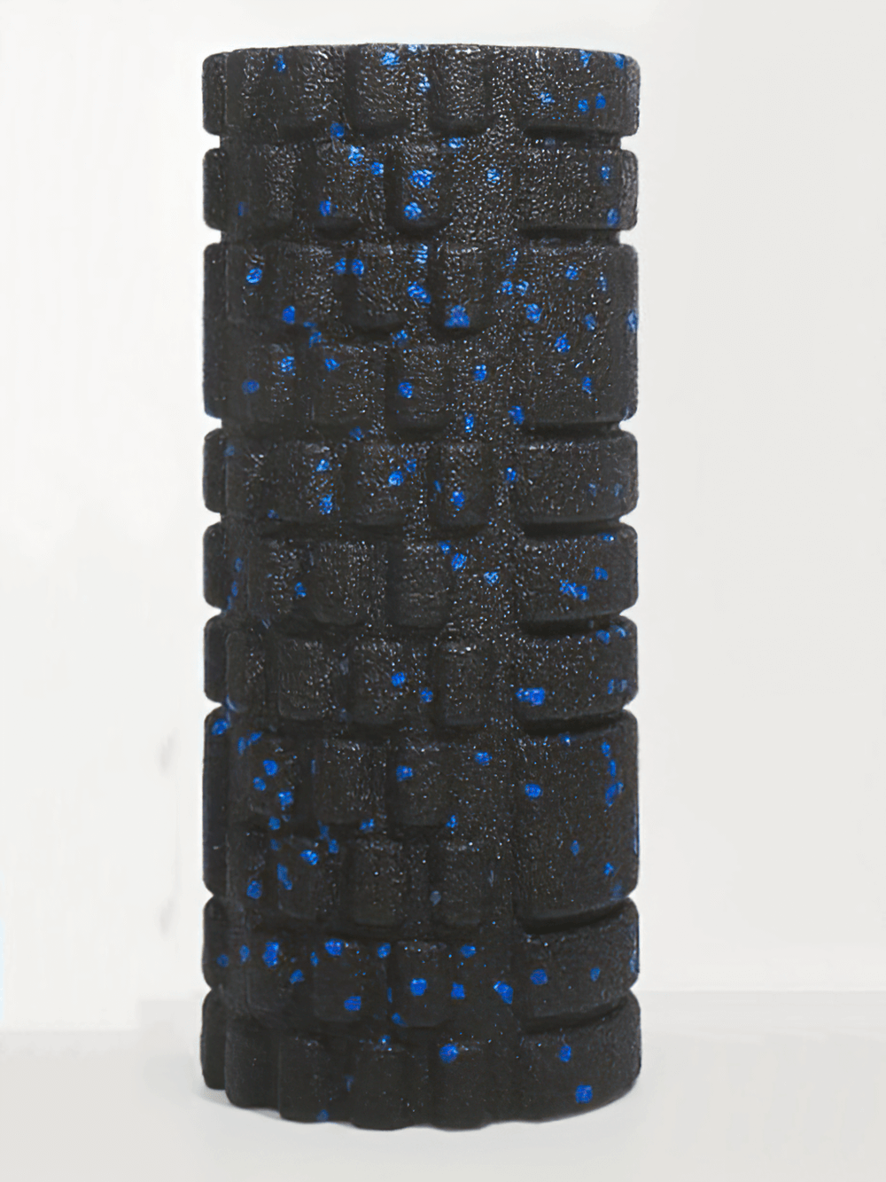 3D textured black foam roller with blue accents for deep tissue massage, ideal for Pilates recovery and muscle relief.