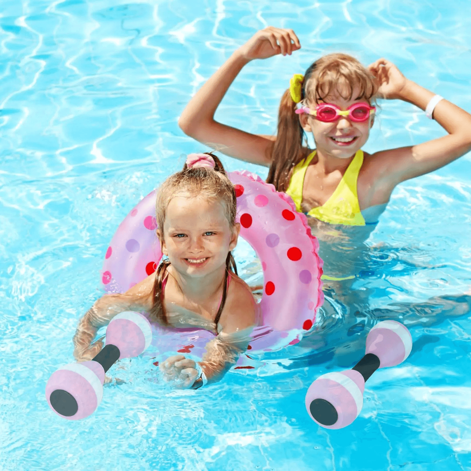 Kids enjoying pool time with pink EVA foam aquatic dumbbells, perfect for water exercise and splash games.