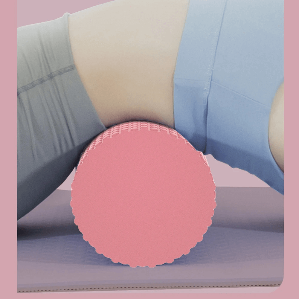 Person using EVA foam yoga roller for muscle relief and stretching