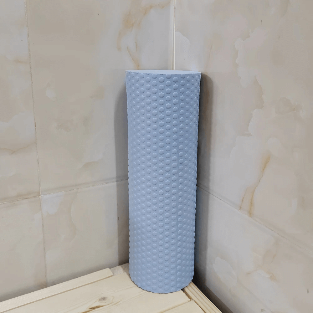 Hexagonal EVA foam yoga roller for Pilates, muscle relief, and stretching, perfect for enhancing flexibility and recovery.