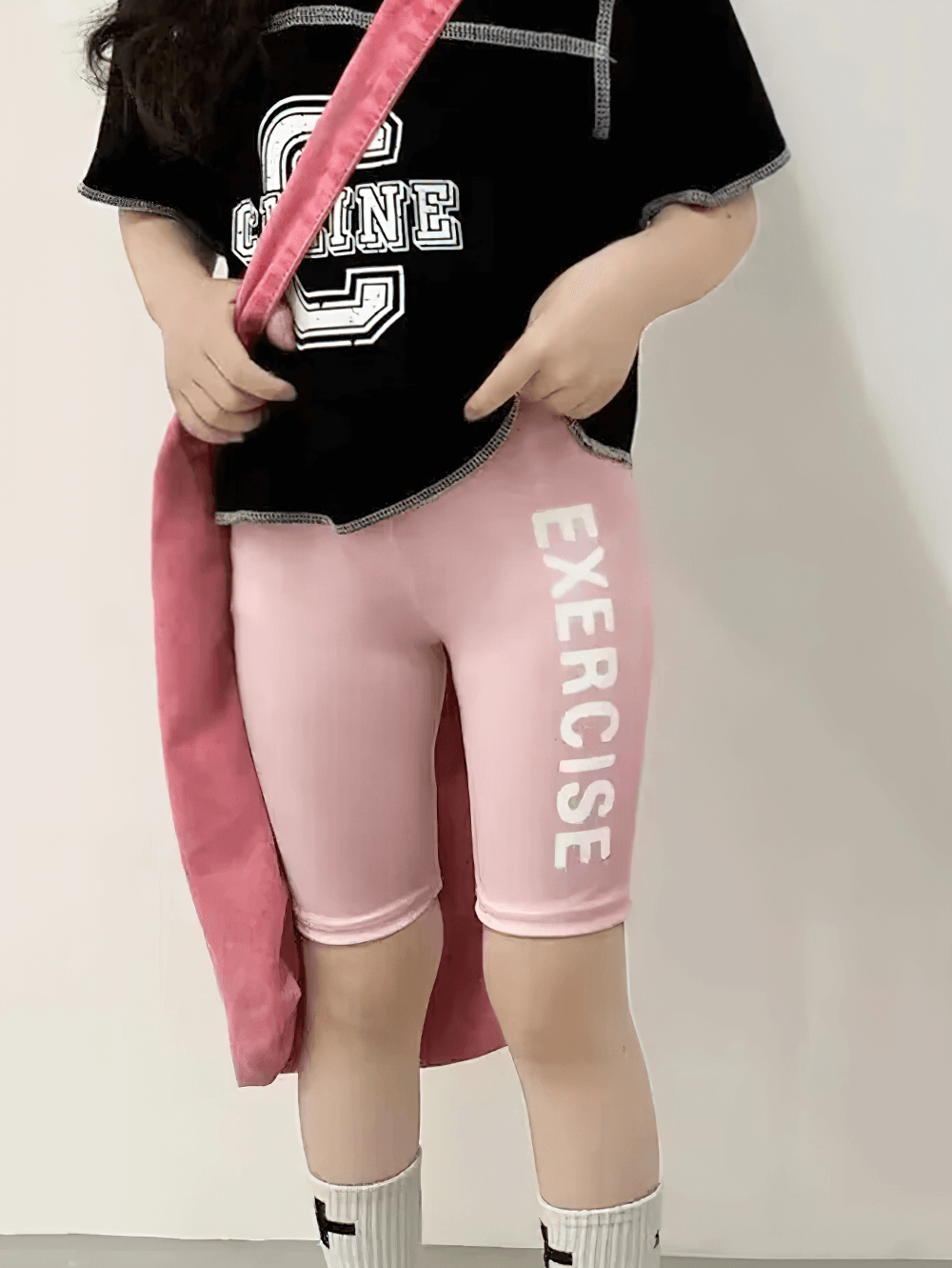 Child wearing Exercise Print Stretch Biker Shorts for Active Wear - SF3758 with bold side print for sporty activities.