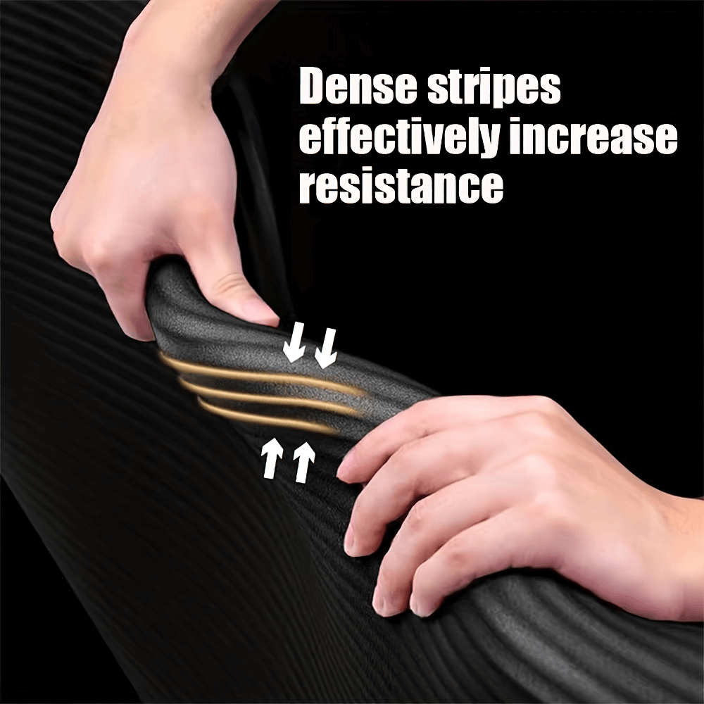 Hands pulling on a textured, non-slip exercise mat, showcasing dense stripes for increased resistance and grip.