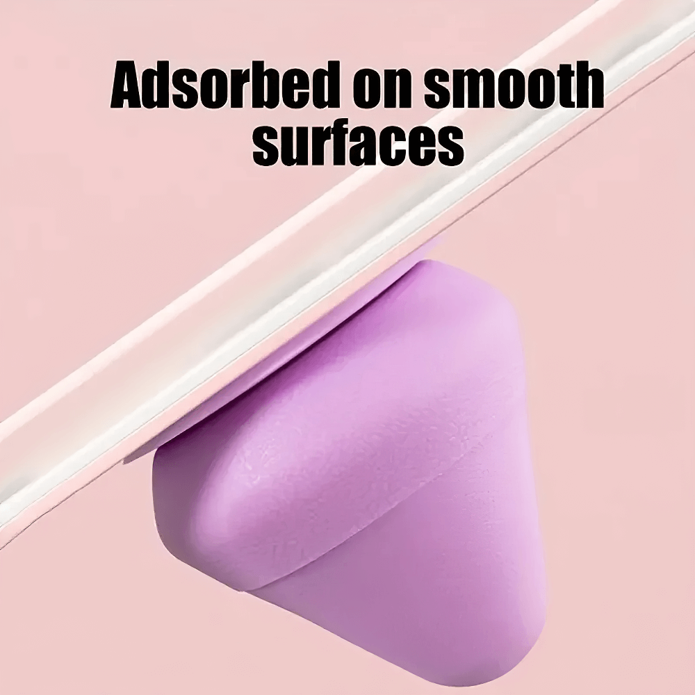 Wall-mounted purple fascia cone massager with suction cup for back and foot relief, attached to smooth surface for targeted muscle relaxation