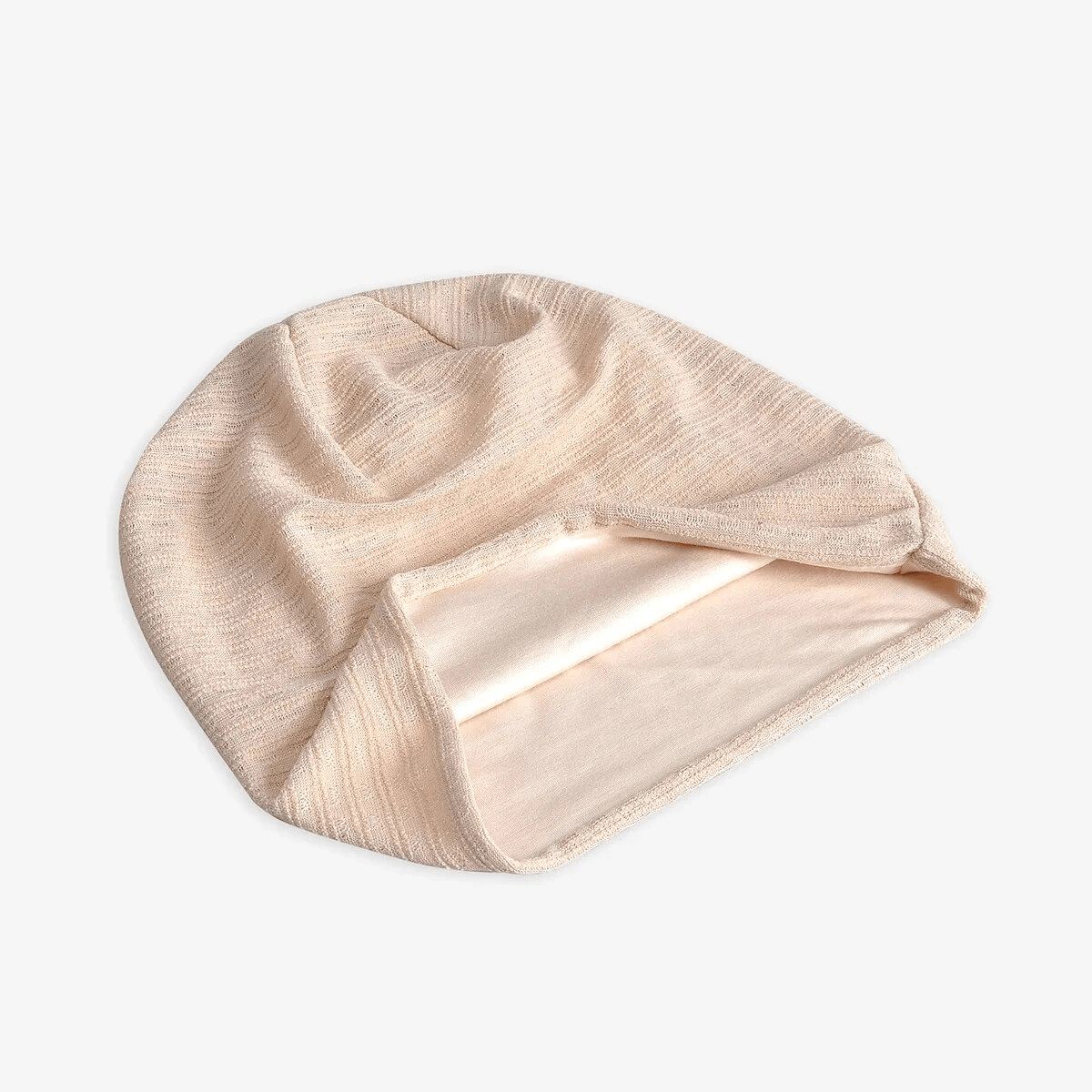 Unisex Fashion Baggy Beanie SF1741 in beige color made from cotton and polyester, perfect for warmth in any setting.
