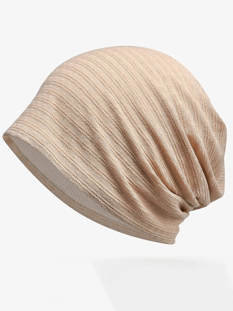 Unisex fashion baggy solid beanie, SF1741. Beige color, cotton-polyester blend for warmth. Casual or formal, perfect cold-weather accessory.