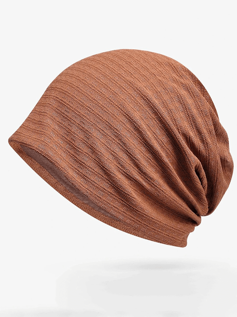 Unisex fashion baggy solid brown beanie SF1741, cotton-polyester blend, offers stylish warmth for men and women in cold weather.