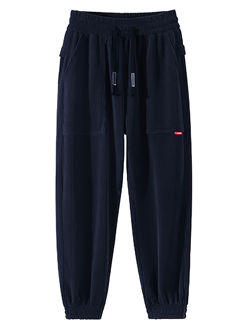 Men's black corduroy sweatpants with elastic hem and drawstring, offering a stylish and comfortable fit for casual wear.