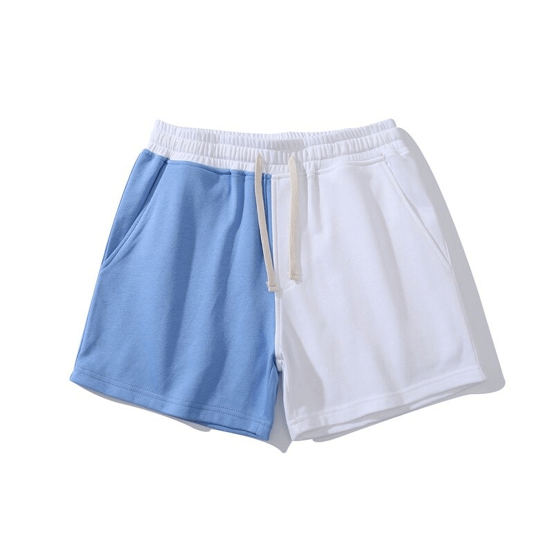 Fashion elastic waist cotton two-color shorts for men, featuring a blue and white patchwork design with mid-waist drawstring.