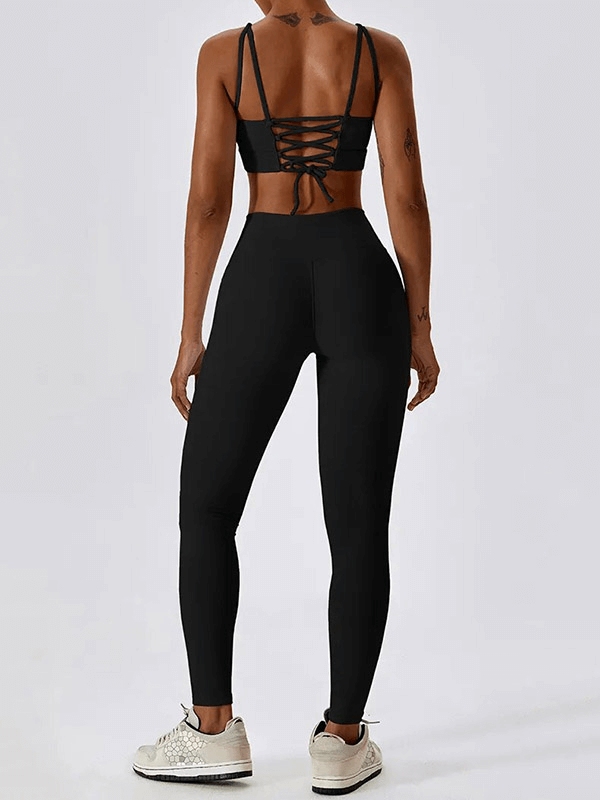 Back view of Fashion Female 2pcs Seamless Sports Compressed Set - SF1717, black, breathable and quick-dry fabric, ideal for workouts.