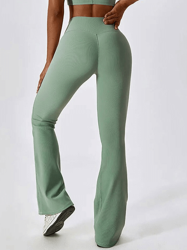 Back view of Fashion Female 2pcs Seamless Sports Set in sage green, featuring comfortable nylon-spandex blend for active wear.