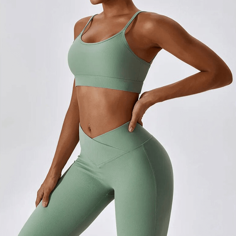 Fashion Female 2pcs Seamless Sports Set in green, featuring a tank top and leggings, perfect for fitness and outdoor activities.