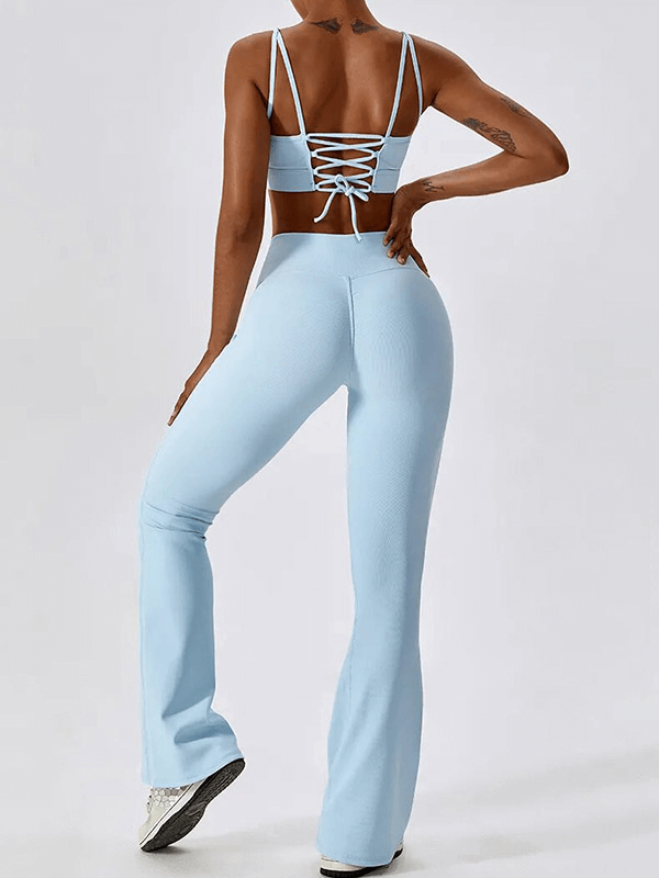 Back view of blue Fashion Female 2pcs Seamless Sports Compressed Set - SF1717, highlighting the stylish design and comfortable fit.