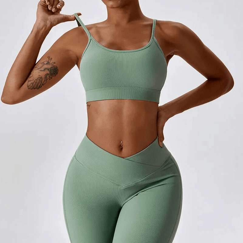 Woman wearing green seamless sports set, perfect for fitness and outdoor activities.
