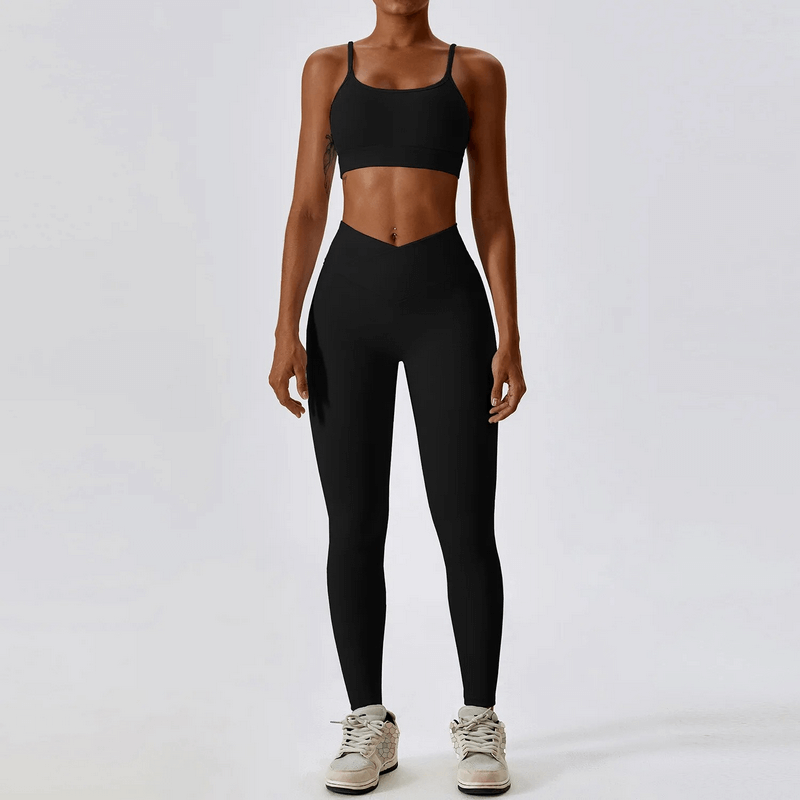 Fashion Female 2pcs Seamless Sports Set SF1717 with anti-pilling, breathable black sports bra and leggings for running or fitness.