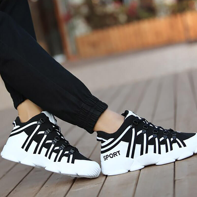 Unisex fashion high lace-up sneakers SF1075 with PU upper, mesh lining, EVA insole, and rubber outsole in black and white design.