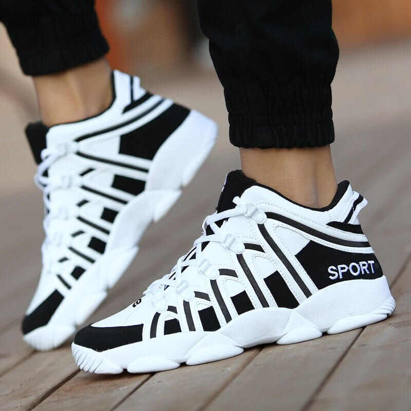 Fashion high lace-up sneakers in black and white with sporty design, unisex PU upper, EVA insole, and rubber outsole, perfect for style and comfort.