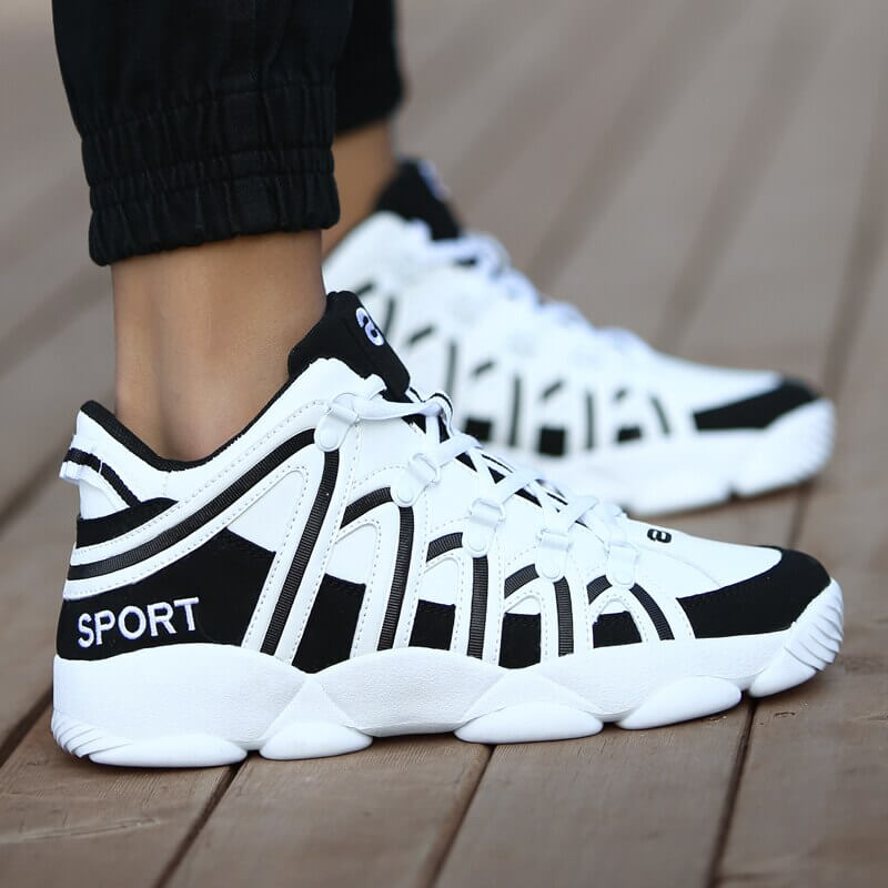 Unisex fashion high lace-up sneakers SF1075 with PU upper and rubber outsole, in black and white design for comfort and style.