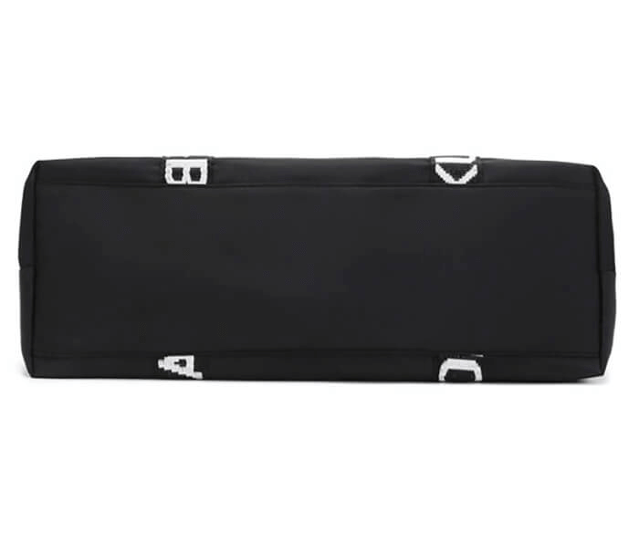 Bottom view of a black nylon lightweight yoga handbag, ideal for women's gym and travel use, showcasing durable design and sleek style.