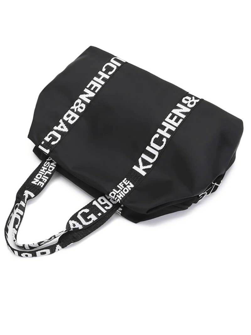 Black large lightweight nylon yoga handbag with stylish text design, perfect for women's gym and travel use.