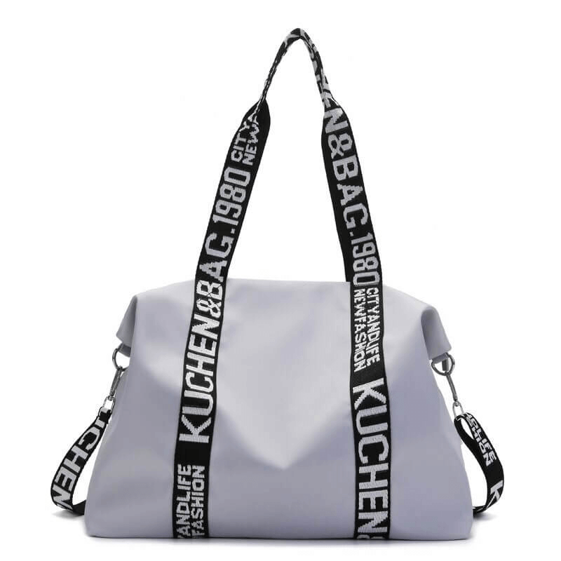 Gray lightweight yoga handbag with stylish lettering straps, perfect for women's gym, travel, and sports. Nylon material, 51x38x15cm size.