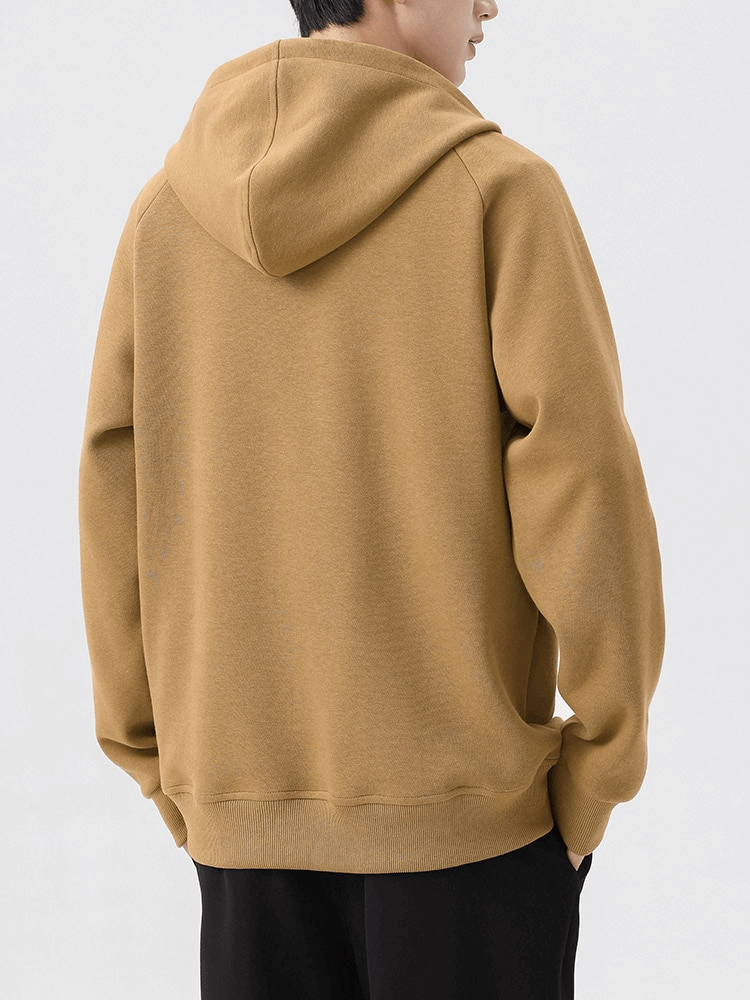 Back view of khaki fashion long sleeves half-zip hoodie with hood, worn by male model. Casual and comfortable design with pockets.