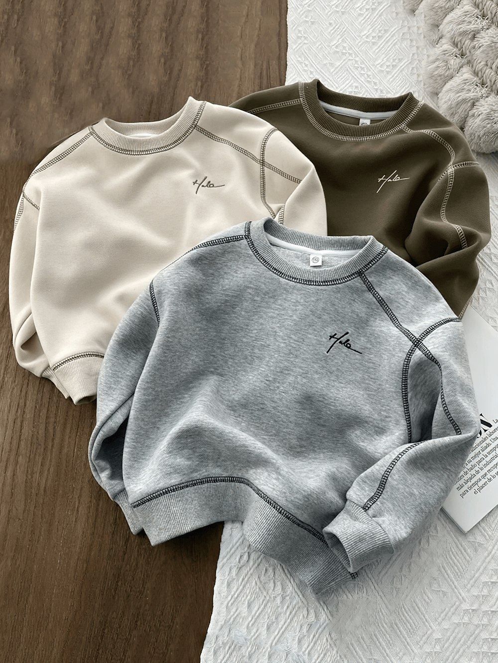 Three Fashion Loose Crewneck Cotton Pullover for Kids - SF3531 in beige, olive, and gray on display.
