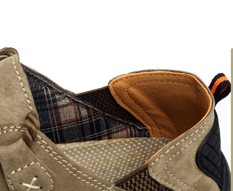 Close-up of Fashion Male Breathable Genuine Leather Shoes with plaid lining and stitching details, perfect for outdoor trekking.