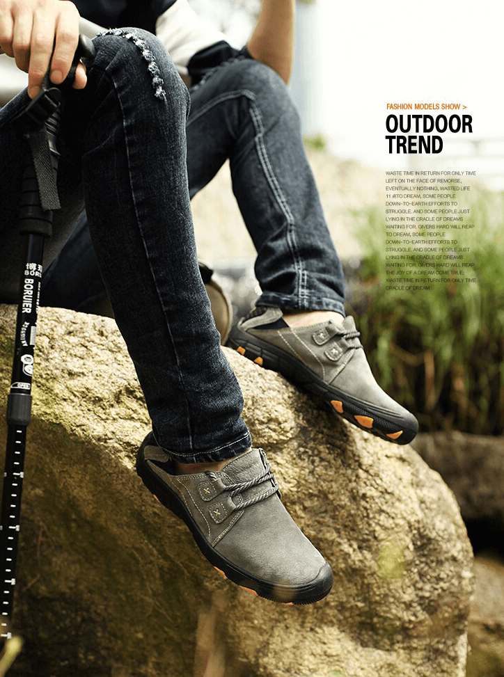 Fashion male breathable leather outdoor trekking shoes SF1344, showcasing style and comfort in a rugged natural setting.