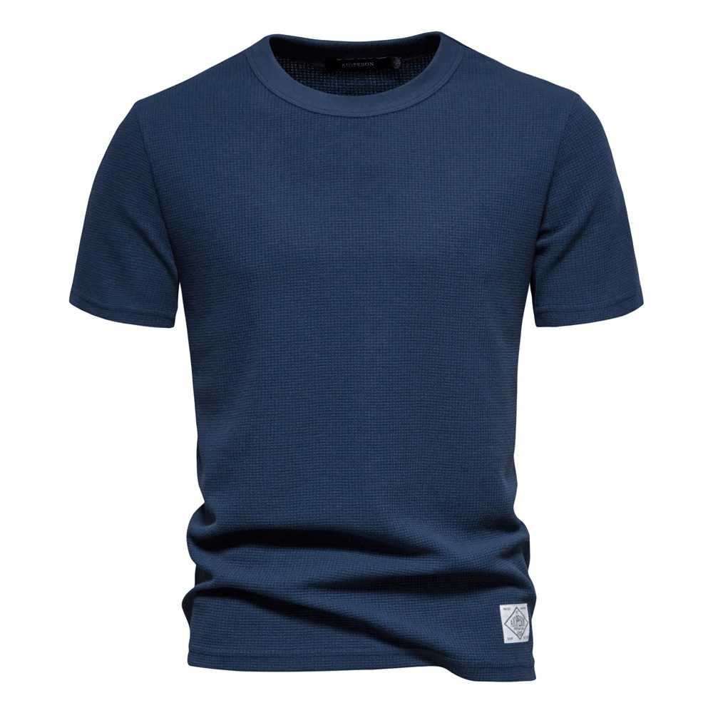 Solid color short sleeves waffle t-shirt in navy blue for men, featuring o-neck collar and comfortable cotton-polyester blend.