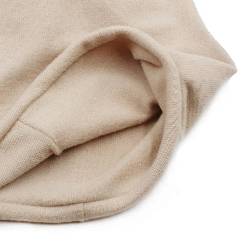 Close-up of a beige multifunction hat scarf made from soft polyester and acrylic, showcasing its texture and stylish design.