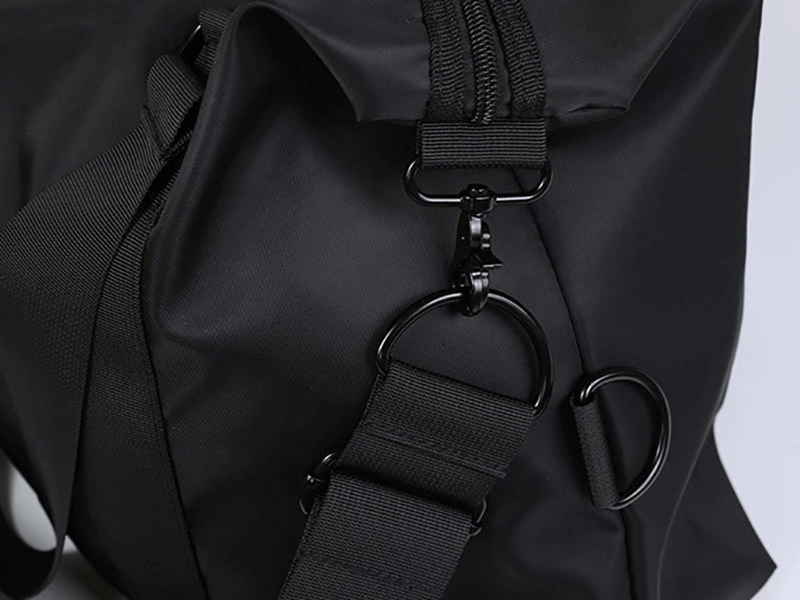 Close-up of black nylon crossbody travel bag SF1959, showing durable straps and zipper, ideal for fitness and outdoor use.